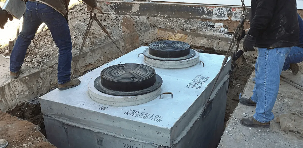 Grease trap installation for a commercial property drainage system in Aurora, CO