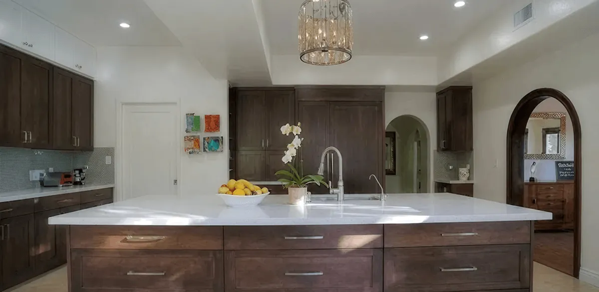 Cabinet refacing project with updated kitchen cabinets and island in Aurora, CO